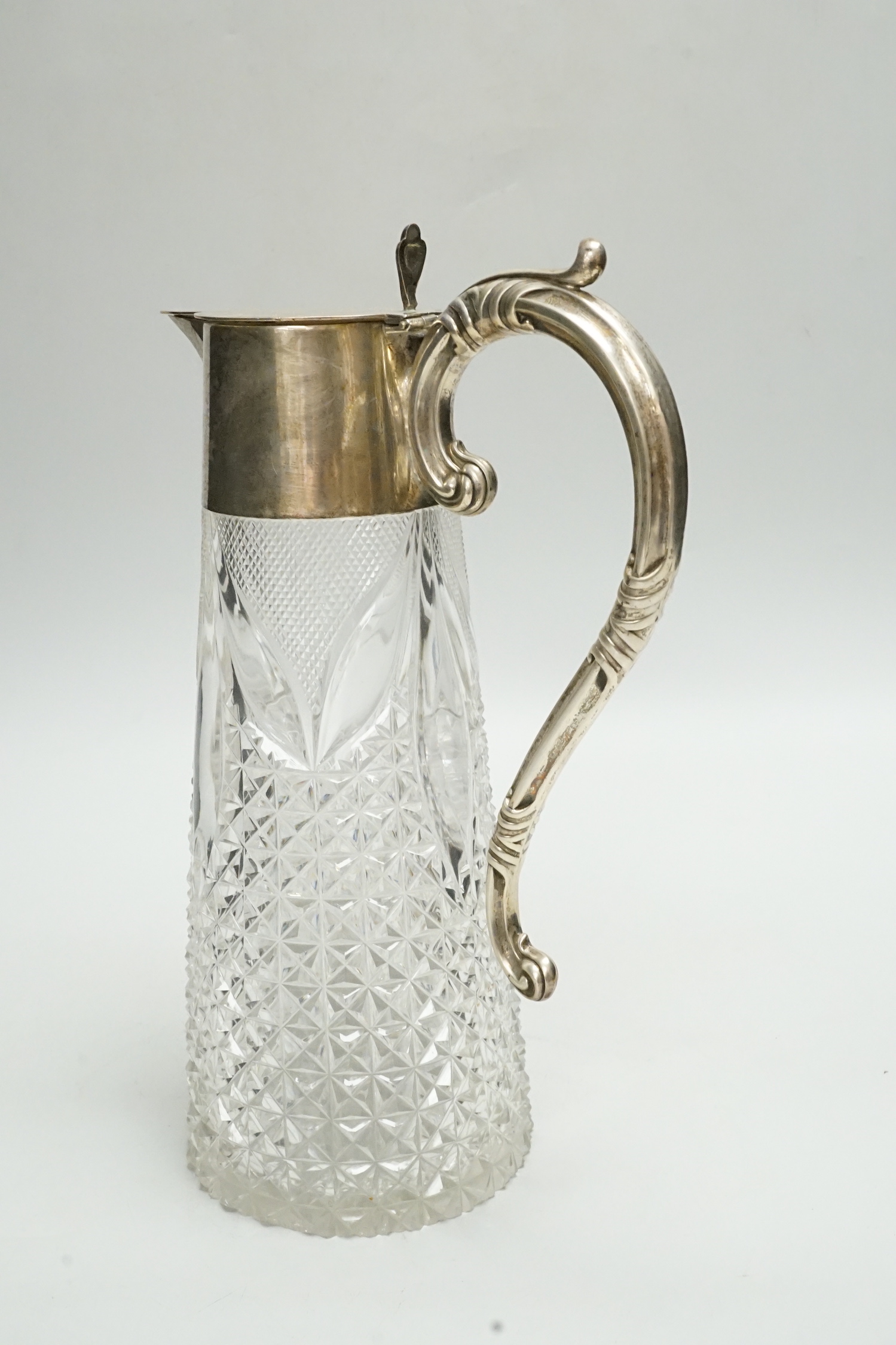 An Edwardian silver mounted cut glass claret jug, WHS, Birmingham, 1901, 26cm.